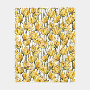 Naadloos patroon met gele tulpen op een witte acht fleece deken