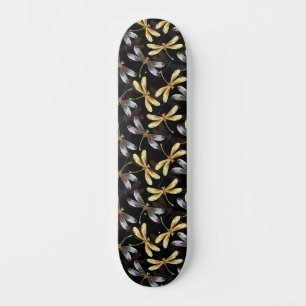 Naadloos patroon met gouden libellen skateboard