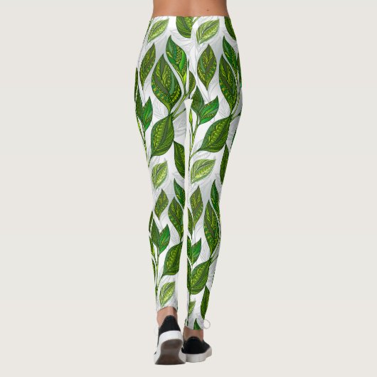 Naadloos patroon met groene theebladeren leggings (Achterkant)