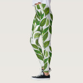 Naadloos patroon met groene theebladeren leggings (Links)