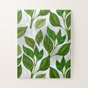 Naadloos patroon met groene theelbladeren legpuzzel