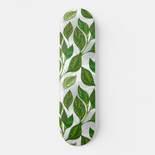 Naadloos patroon met groene theelbladeren skateboard