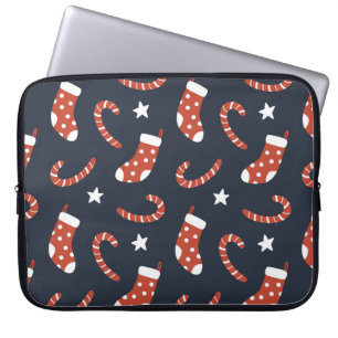 Naadloos patroon met kerstsokken, snoepsnoeren laptop sleeve