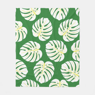 Naadloos patroon van wit monstera-bladeren op een  fleece deken