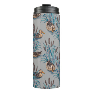 naadloze zwarte boom met kleurig bloempatroon thermosbeker