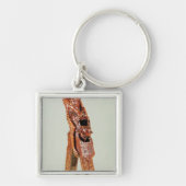 Naaldscheurtjes in de vorm van een man sleutelhanger (Voorkant)