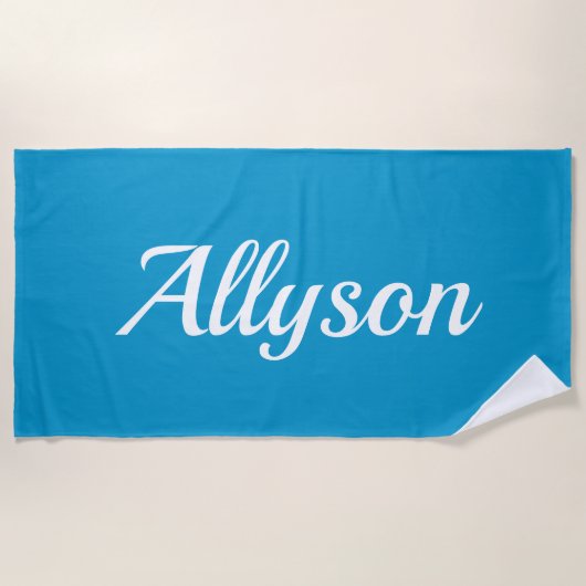Naam personaliseren, wit script / blauw strandlaken (Voorkant)