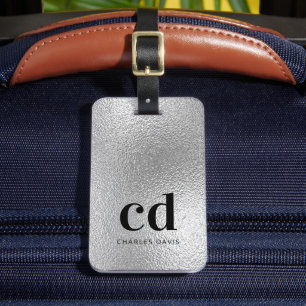 Naam van de initialen voor zilveren monogram bagagelabel