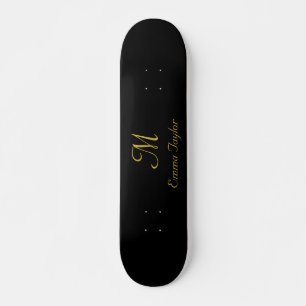 naam voor zwart-wit en gouden monogram skateboard
