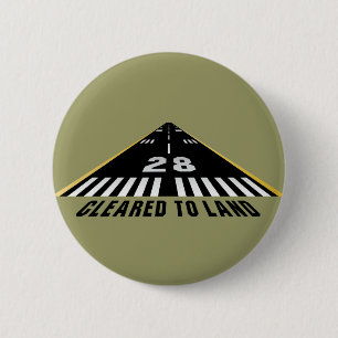 Naar landbaan geklaard ronde button 5,7 cm