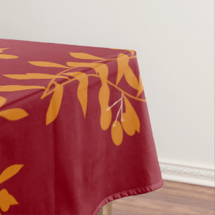 Nappe Feuilles de branches de silhouette orange sur roug
