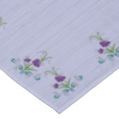 Nappe Fleur violette joueuse avec perruques Turquoises d (Angle)