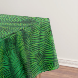 Nappe motif vert en feuilles de palmiers.