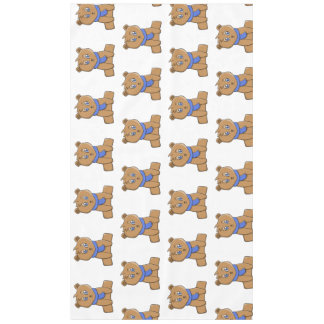 Nappe Ours en peluche portant une écharpe bleue