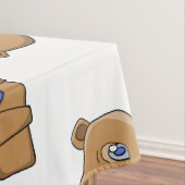 Nappe Ours en peluche portant une écharpe bleue (In Situ)