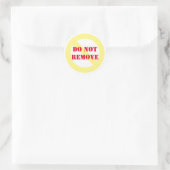 Ne pas enlever les stickers ronds (Sac)
