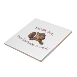 Neem me niet kwalijk dat je vogelvoer leeg is. tegeltje