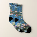 Nénuphars de Claude Monet, Impressionnisme Vintage<br><div class="desc">Nénuphar (1914) de Claude Monet est une peinture de nature impressionniste vintage. Une des nombreuses variations de peintures florales de nénuphars que Monet peint par l'étang dans son jardin fleuri à Giverny, France. À propos de l'artiste : Claude Monet (1840-1926) est un fondateur du mouvement de peinture impressionniste française, dont...</div>