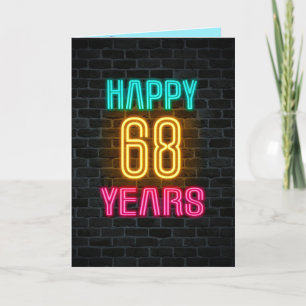 Neon bord op baksteen voor 68ste verjaardag kaart