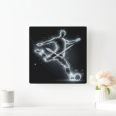 Neon voetbalspeler op zwart vierkante klok (Huis)