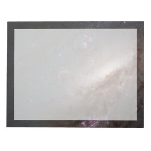 NGC 4258 Ondergaat intense stervorming. Notitieblok