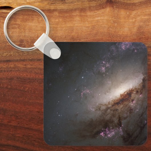 NGC 4258 Ondergaat intense stervorming. Sleutelhanger (Voorkant)