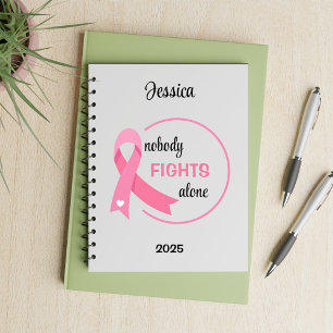 Niemand vecht alleen roze lint notitieboek