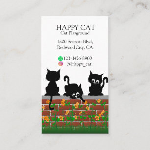 Nieuwsgierige katten op een tuinmuur visitekaartje