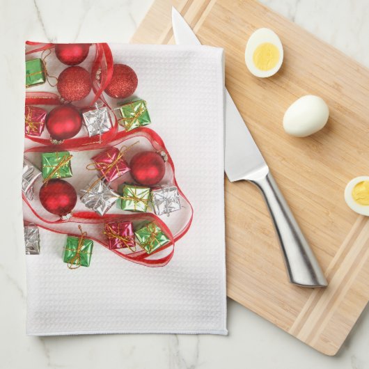 Noël a décoré la serviette de cuisine d'arbre (Quart Plié)