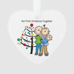 Noël de bébé de parents le ęr ornementent ensemble