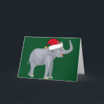 Noël Eléphant mignon à Santa Hat Carte de vacances<br><div class="desc">Les mignons animaux de vacances sont ma partie préférée de Noël. Un bel éléphant gris portant un chapeau de Père Noël rouge et ayant l'air heureux sur un arrière - plan vert festif. Ça me remplit d'esprit de Noël.</div>