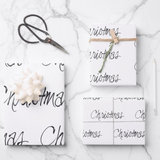 Noël manuscrit en papier d'enveloppement noir (Recto)