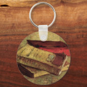 Nog steeds leven met drie boeken van Vincent van G Sleutelhanger (Voorkant)