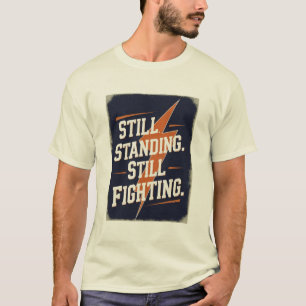 "Nog steeds overeind. Nog steeds vechtend." MS T-s T-shirt