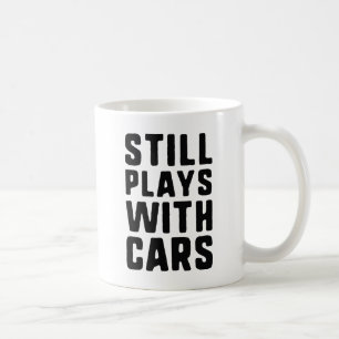 Nog steeds speelt met auto's koffiemok