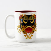 Noircissez 'les tasses chinoises de visage de (Gauche)