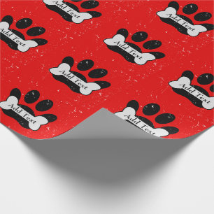Noodlijdende hond pow print en bot op rood cadeaupapier