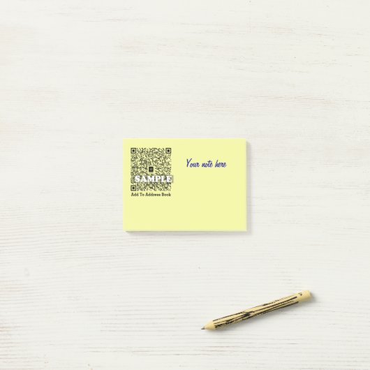 Note de post-it avec le code de QR (Sur un bureau)