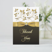 Note florale noire, blanche, et d'or de Merci (Debout devant)