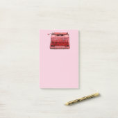 Note post-it de machine à écrire rouge (Sur un bureau)