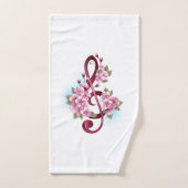 Notes de clef musicale en treble avec des fleurs S (Serviette à main)