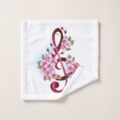 Notes de clef musicale en treble avec des fleurs S (Gant de toilette)