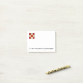 Notes de post-it de bloc d'édredon (Sur un bureau)