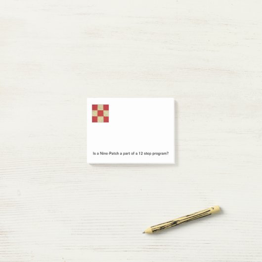 Notes de post-it de bloc d'édredon (Sur un bureau)