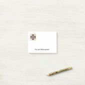 Notes de post-it de bloc d'édredon E (Sur un bureau)