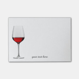 Notes de post-it en verre de vin rouge