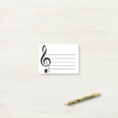Notes musicales post-it pour le grand clic de fer (Sur un bureau)