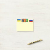 Notes post-it de la paix (Sur un bureau)