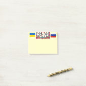 Notes post-it de la paix (Sur un bureau)