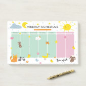 Notes Post-it® de l'agenda hebdomadaire (Sur un bureau)